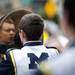 A member of the Michigan Marching Band's reflection in a symbol as he performs on Saturday. Daniel Brenner I AnnArbor.com